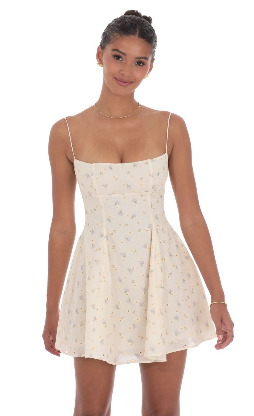 Picture Floral Eyelet Fit and Flare Dress in Cream. Source: https://media-img.lucyinthesky.com/data/product-media/850xAUTO/4d2f60b1-93c5-4885-aa04-21ee777c95bc.jpg