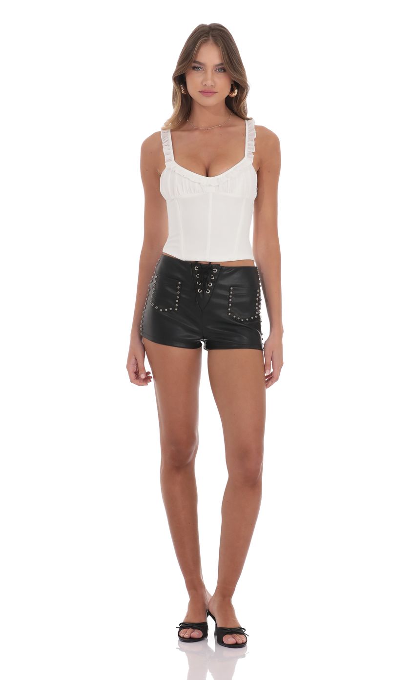 Picture Studded Faux Leather Shorts in Black. Source: https://media-img.lucyinthesky.com/data/product-media/850xAUTO/4d4f6ea3-563f-4ad8-92c1-2e7d6562e94c.jpg