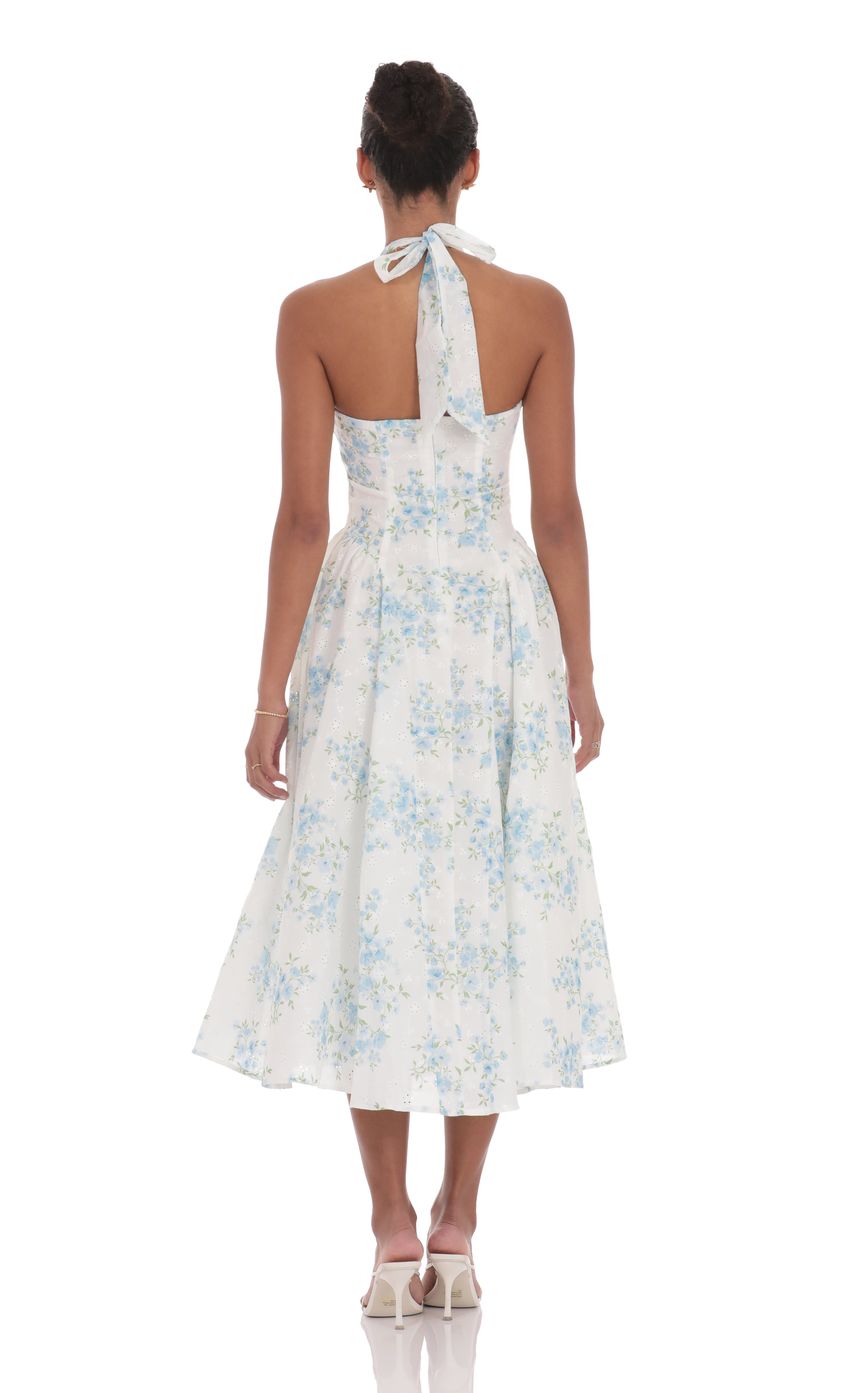 Picture Floral V-Neck Midi Dress in White. Source: https://media-img.lucyinthesky.com/data/product-media/850xAUTO/4f068e75-67bc-49db-976d-6df0dde96c1a.jpg