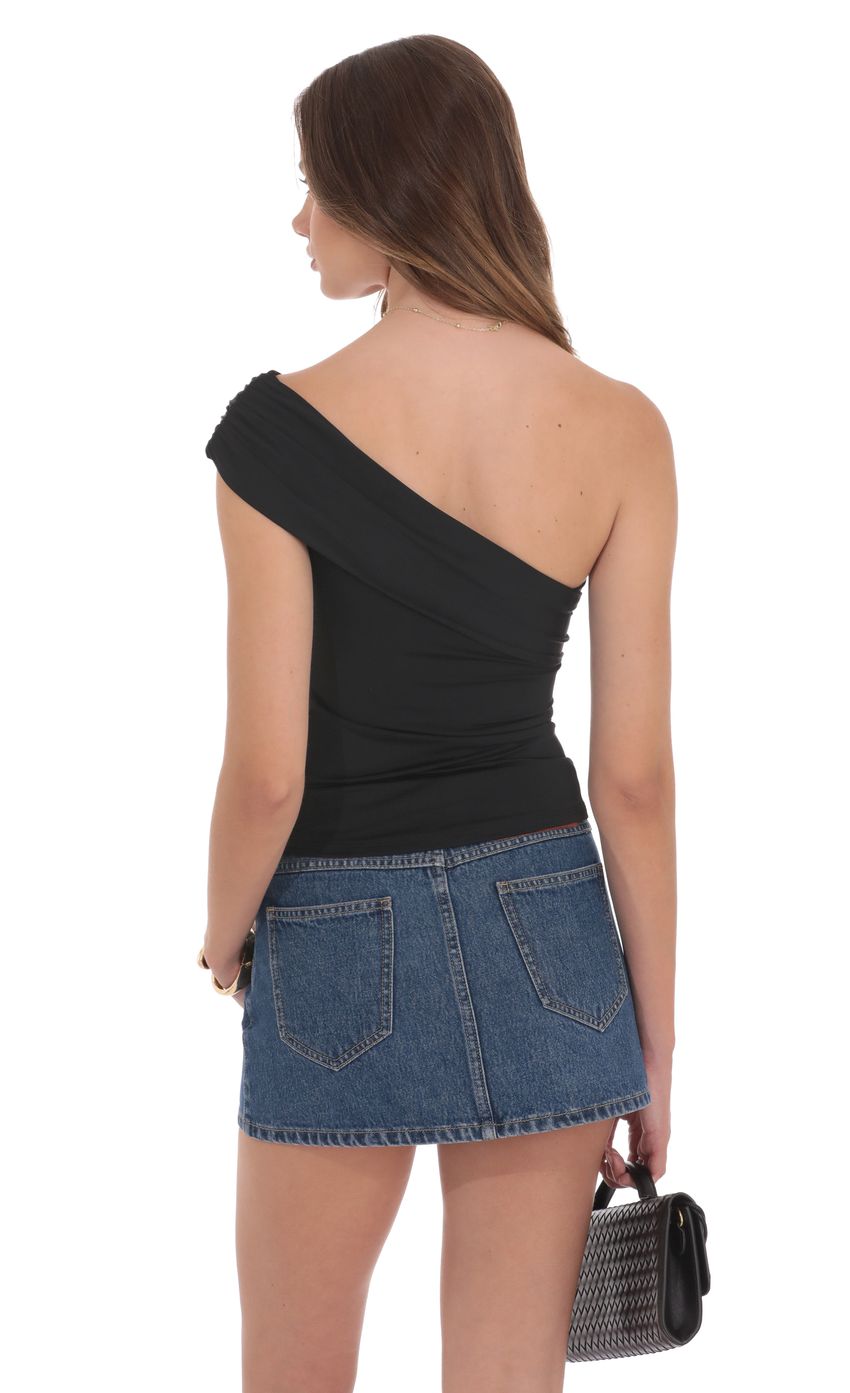 Picture Embellished Capped One Shoulder Top in Black. Source: https://media-img.lucyinthesky.com/data/product-media/850xAUTO/4f41100f-ddfc-4fbf-a7d2-d077822d9c99.jpg