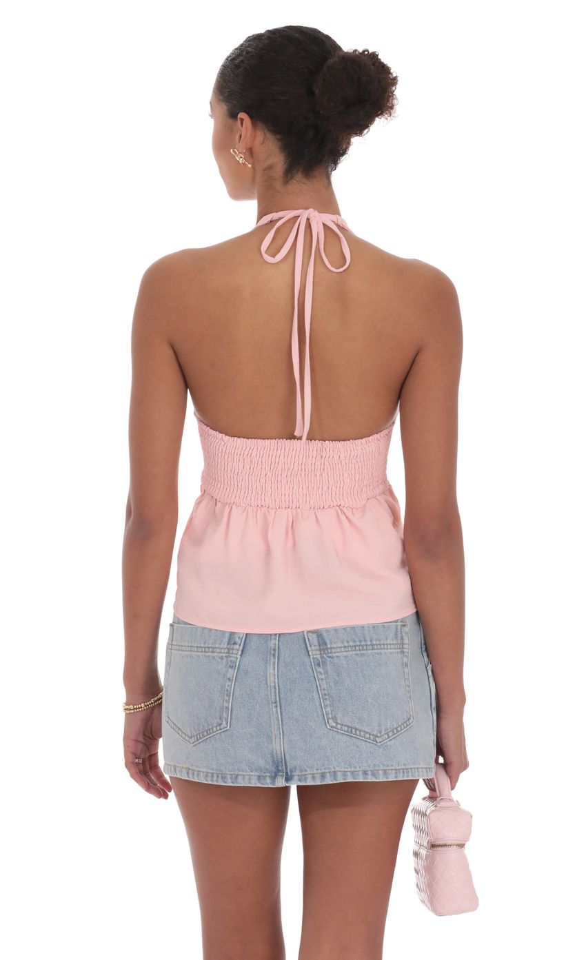 Picture Scrunch Halter Top in Pink. Source: https://media-img.lucyinthesky.com/data/product-media/850xAUTO/52bcbd13-4c1f-41e0-931b-4cbea745ebd5.jpg