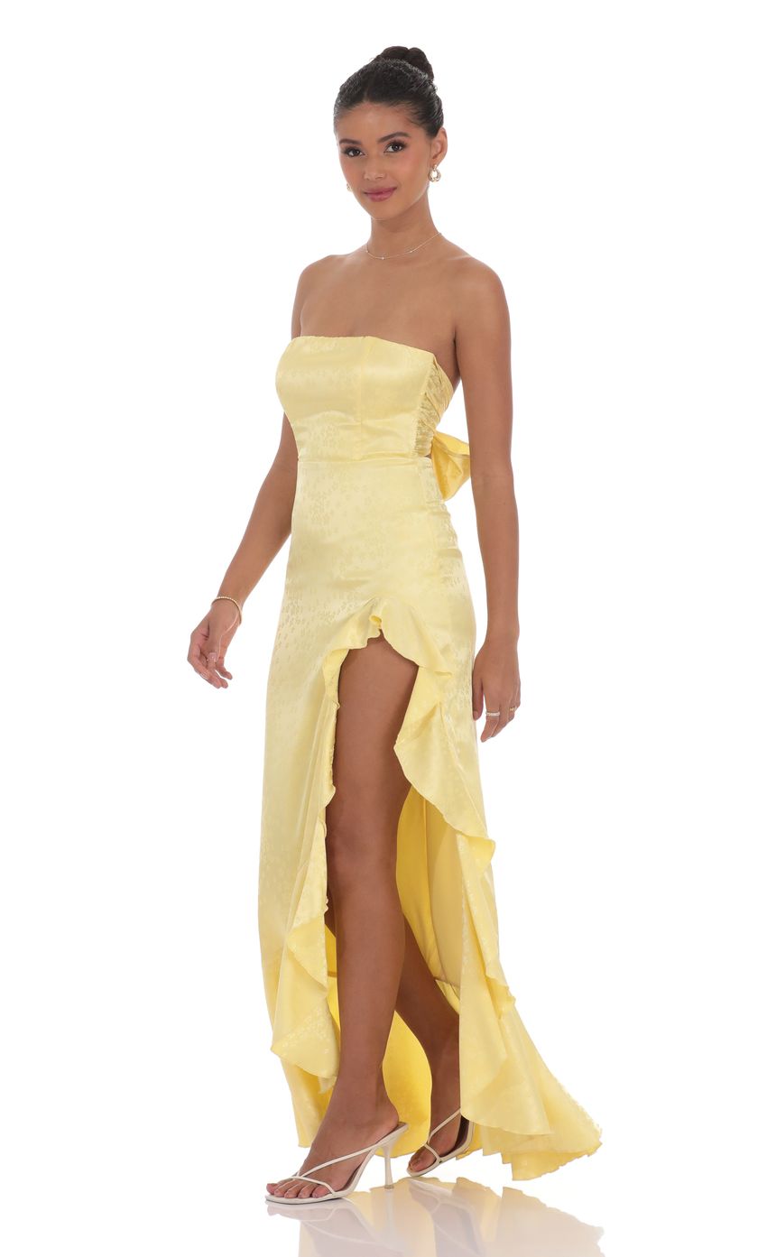 Picture Satin Jacquard Back Bow Corset Maxi Dress in Yellow. Source: https://media-img.lucyinthesky.com/data/product-media/850xAUTO/5972988f-17e0-45b3-8bdf-6da6893f738a.jpg
