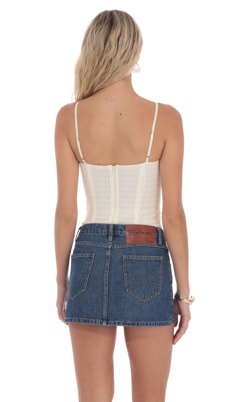 Picture Low Rise Denim Mini Skirt in Blue. Source: https://media-img.lucyinthesky.com/data/product-media/850xAUTO/598e153e-b5b0-4eb8-b02f-0dbd52f54ffd.jpg