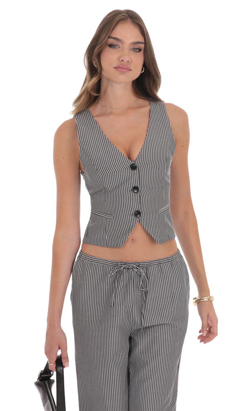 Picture Pinstripe Buttoned Vest in Grey. Source: https://media-img.lucyinthesky.com/data/product-media/850xAUTO/5bcd0a1a-22b9-4f9c-adba-a8dcf53b04c1.jpg