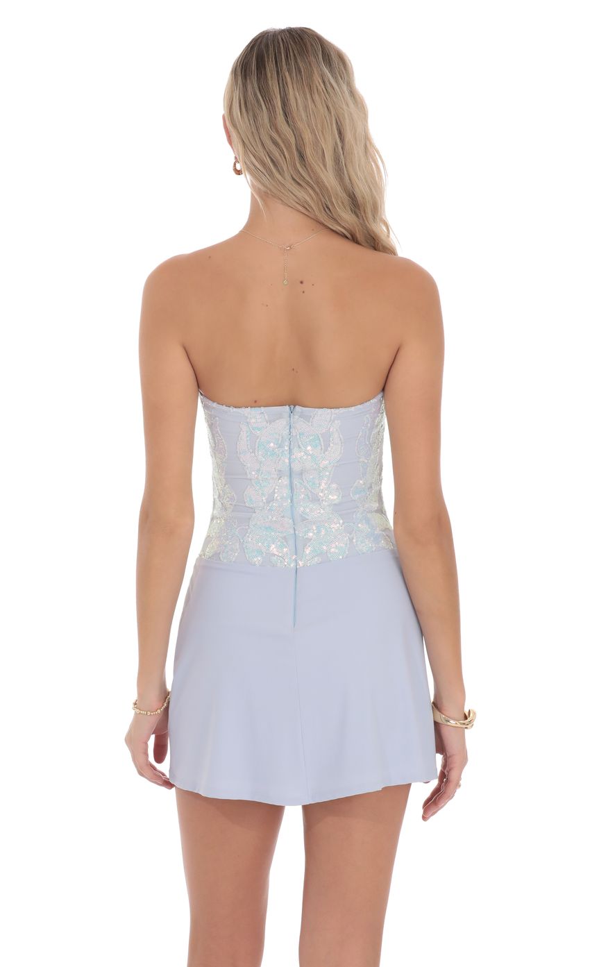 Picture Sequin Draped Waist Dress in Pastel Blue. Source: https://media-img.lucyinthesky.com/data/product-media/850xAUTO/5cb4acb1-8543-47d2-bd75-0ec6c7a83889.jpg
