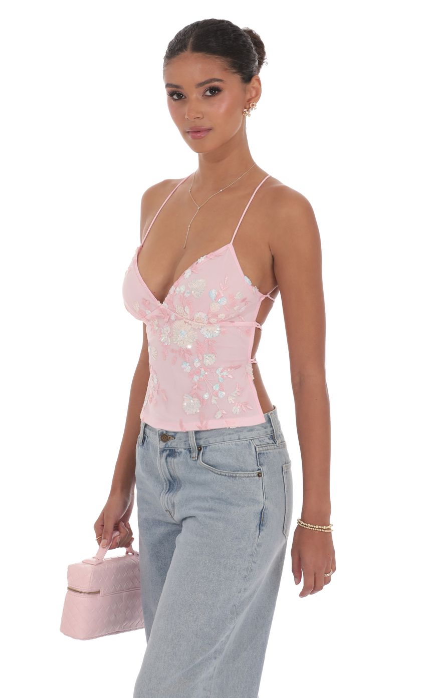 Picture Open Back Sequin Floral Top in Pink. Source: https://media-img.lucyinthesky.com/data/product-media/850xAUTO/5d162619-6833-4a68-92ba-2b0402eb3405.jpg