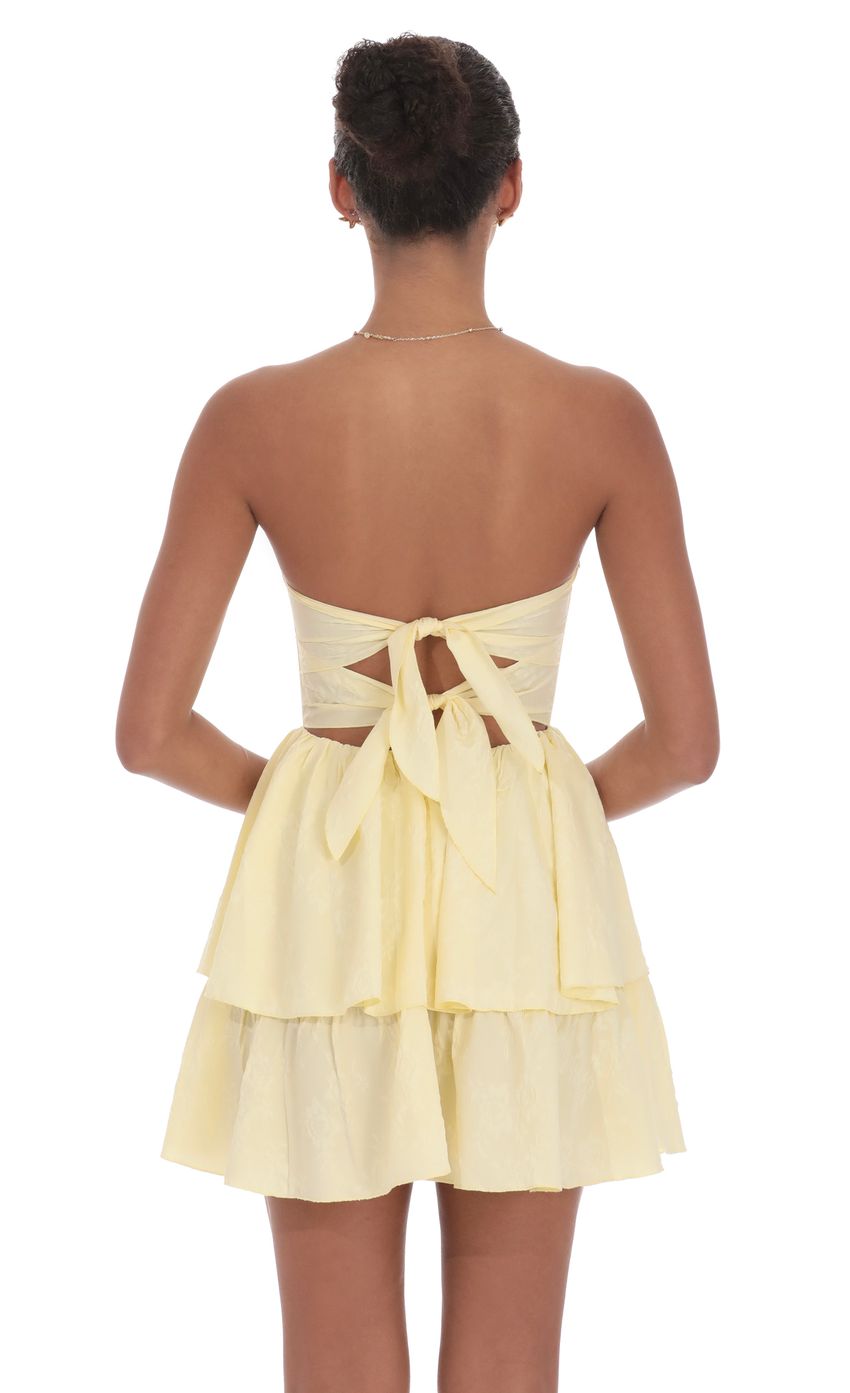 Picture Jacquard Corset Mini Dress in Yellow. Source: https://media-img.lucyinthesky.com/data/product-media/850xAUTO/5e12e71f-5ec1-44ae-8deb-f6900ba09fea.jpg