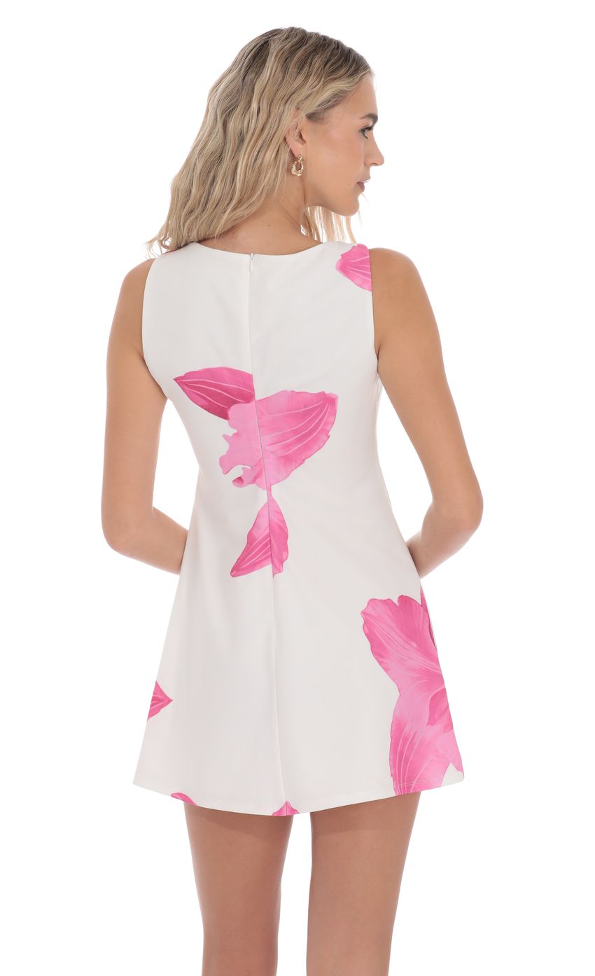 Picture Floral High Neck Dress in White. Source: https://media-img.lucyinthesky.com/data/product-media/850xAUTO/5ff8869c-82cc-48f4-92ee-702da5cef7f9.jpg