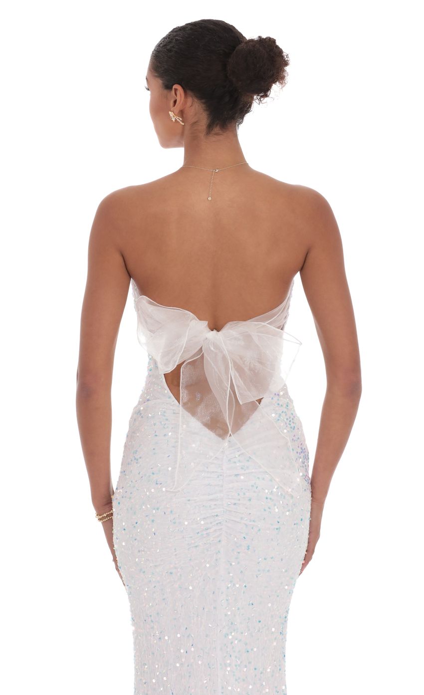 Picture Velvet Sequin Strapless Maxi Dress in White. Source: https://media-img.lucyinthesky.com/data/product-media/850xAUTO/6190c3b8-b4bd-441c-9a11-4d4b87e2b246.jpg