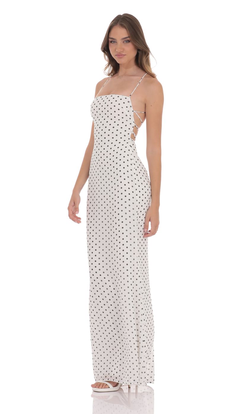 Picture Polka Dot Open Back Maxi Dress in White. Source: https://media-img.lucyinthesky.com/data/product-media/850xAUTO/62327fe7-76b1-4894-857d-40ed33e3d339.jpg