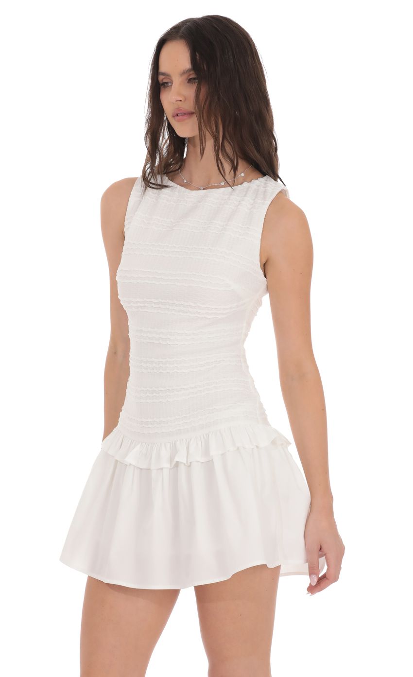 Picture Textured High Neck Dress in White. Source: https://media-img.lucyinthesky.com/data/product-media/850xAUTO/63a1654c-6043-4465-a1bb-b06e97aa108e.jpg