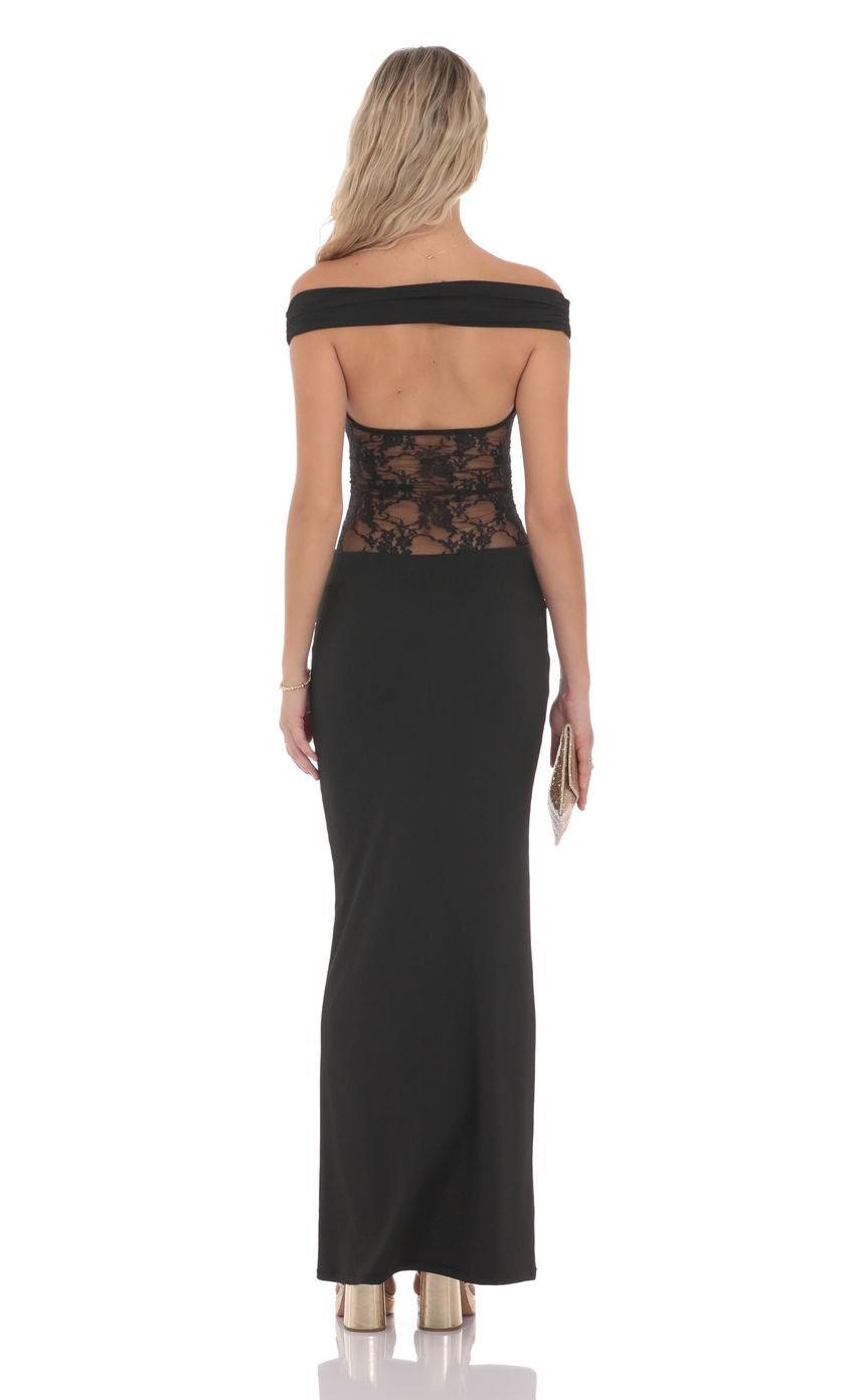 Picture Off Shoulder Lace Cutout Maxi Dress in Black. Source: https://media-img.lucyinthesky.com/data/product-media/850xAUTO/63ca2155-f3b1-4f28-9869-768a7013266d.jpg