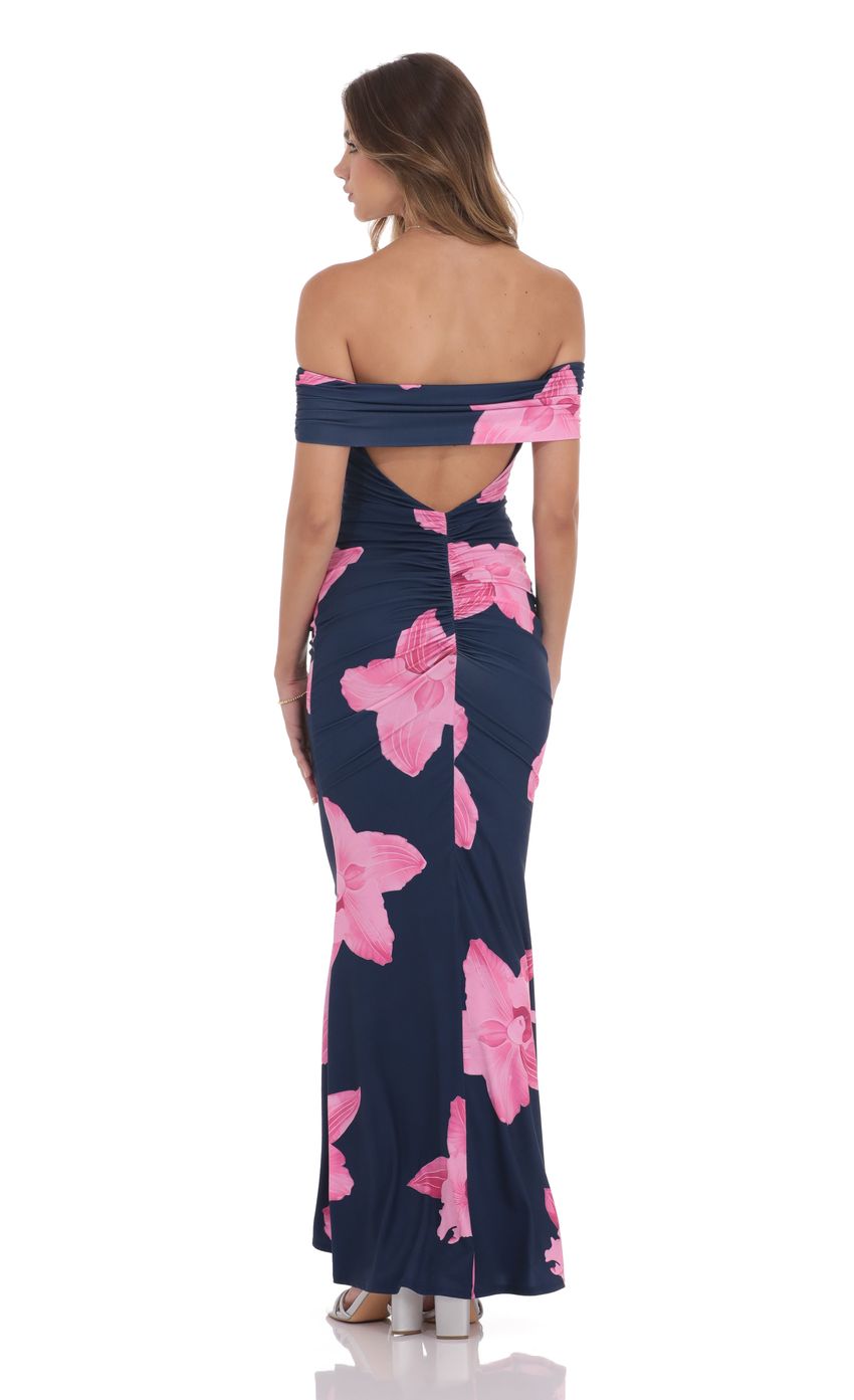 Picture Off Shoulder Pink Floral Maxi Dress in Navy. Source: https://media-img.lucyinthesky.com/data/product-media/850xAUTO/6710de5a-8639-4dcf-9648-a6cb47d4aa1e.jpg