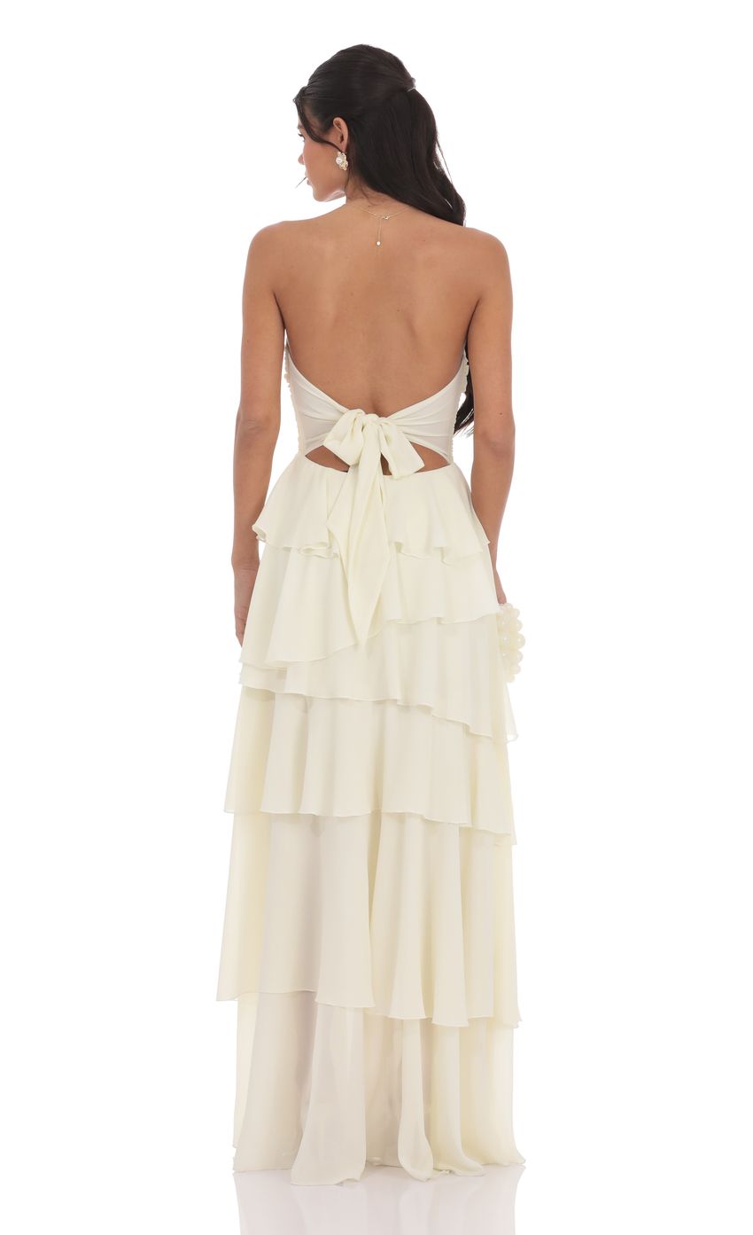 Picture Corset Ruffle Strapless Maxi Dress in Pastel Yellow. Source: https://media-img.lucyinthesky.com/data/product-media/850xAUTO/68c38a09-8133-4090-a375-04dc81a655fc.jpg