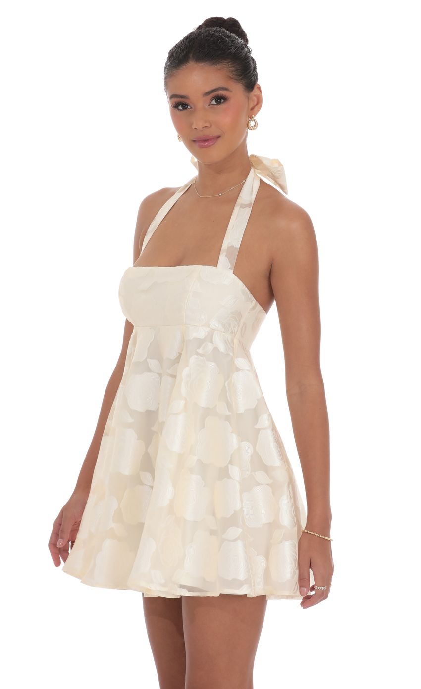 Picture Floral Flare Babydoll Dress in Cream. Source: https://media-img.lucyinthesky.com/data/product-media/850xAUTO/6a5b629e-dfb6-4102-bee0-7df50ace1d70.jpg
