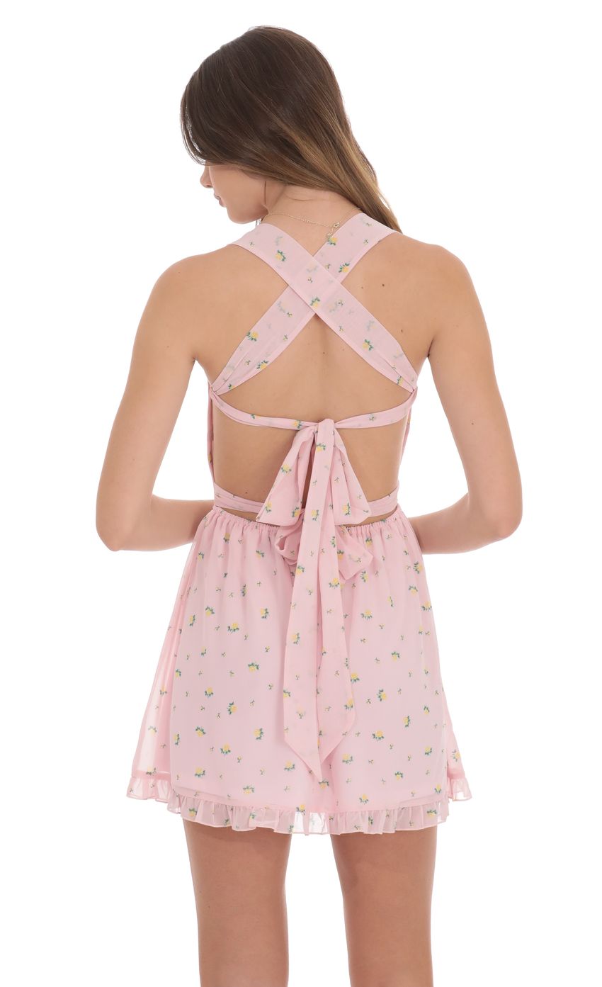 Picture Floral Strappy Back Bows Dress in Pink. Source: https://media-img.lucyinthesky.com/data/product-media/850xAUTO/6a6adfd5-f028-4c6e-a878-c4d0646e1359.jpg