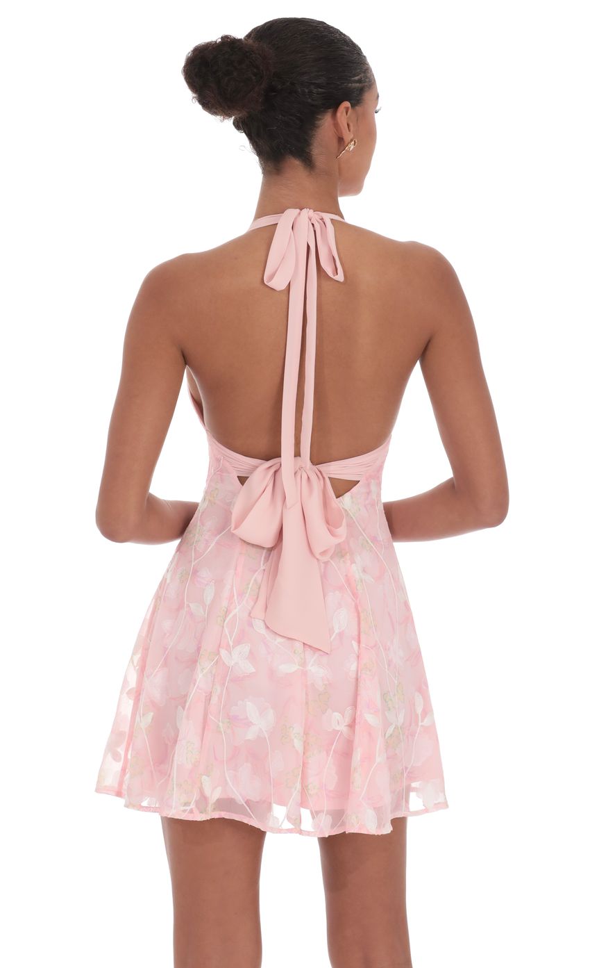 Picture Floral Halter Open Back Dress in Pink. Source: https://media-img.lucyinthesky.com/data/product-media/850xAUTO/6befa491-8461-4cdf-a05d-0dd0bbaf547d.jpg