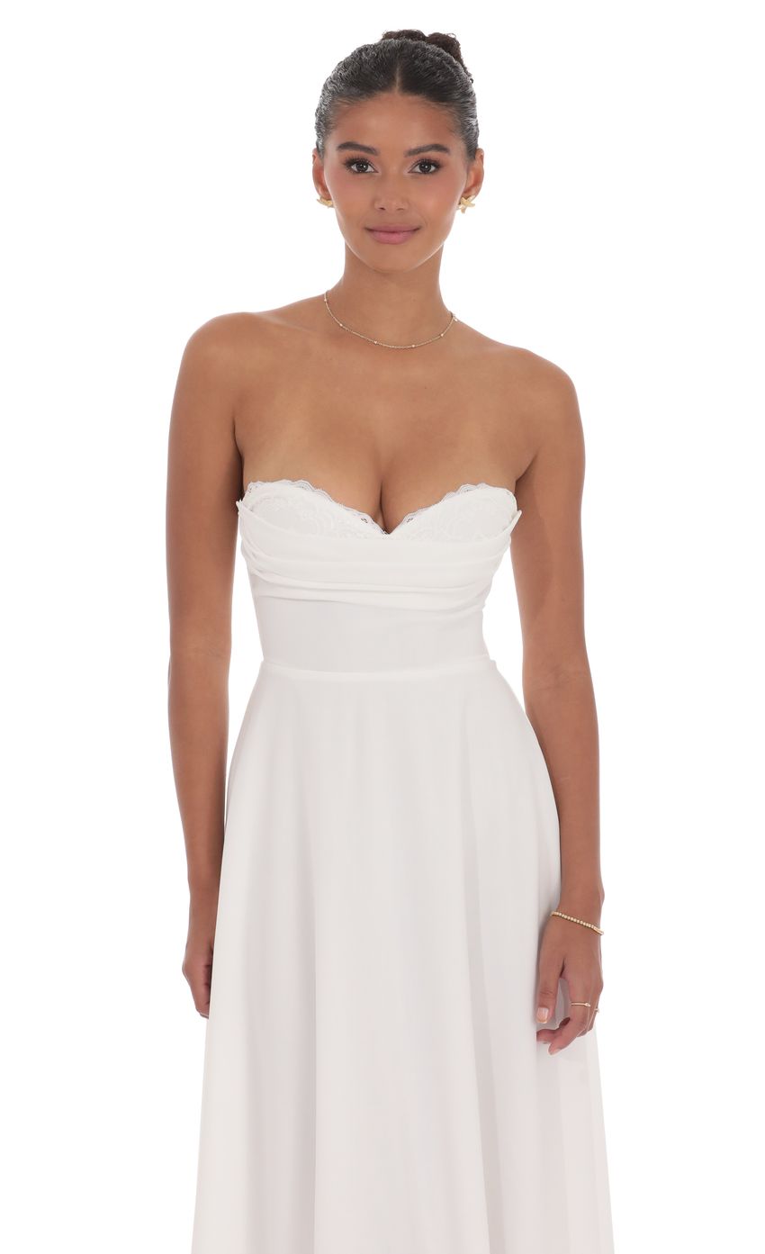Picture Lace Bust A-Line Midi Dress in White. Source: https://media-img.lucyinthesky.com/data/product-media/850xAUTO/6dc0b352-0cc9-42df-a6e8-04f289492e7a.jpg
