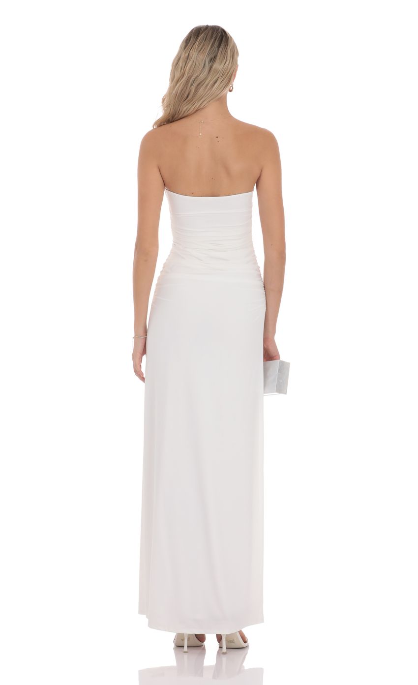 Picture Embellished Strapless Maxi Dress in White. Source: https://media-img.lucyinthesky.com/data/product-media/850xAUTO/6df83a69-850e-4bba-ae22-6a579d38ff1d.jpg