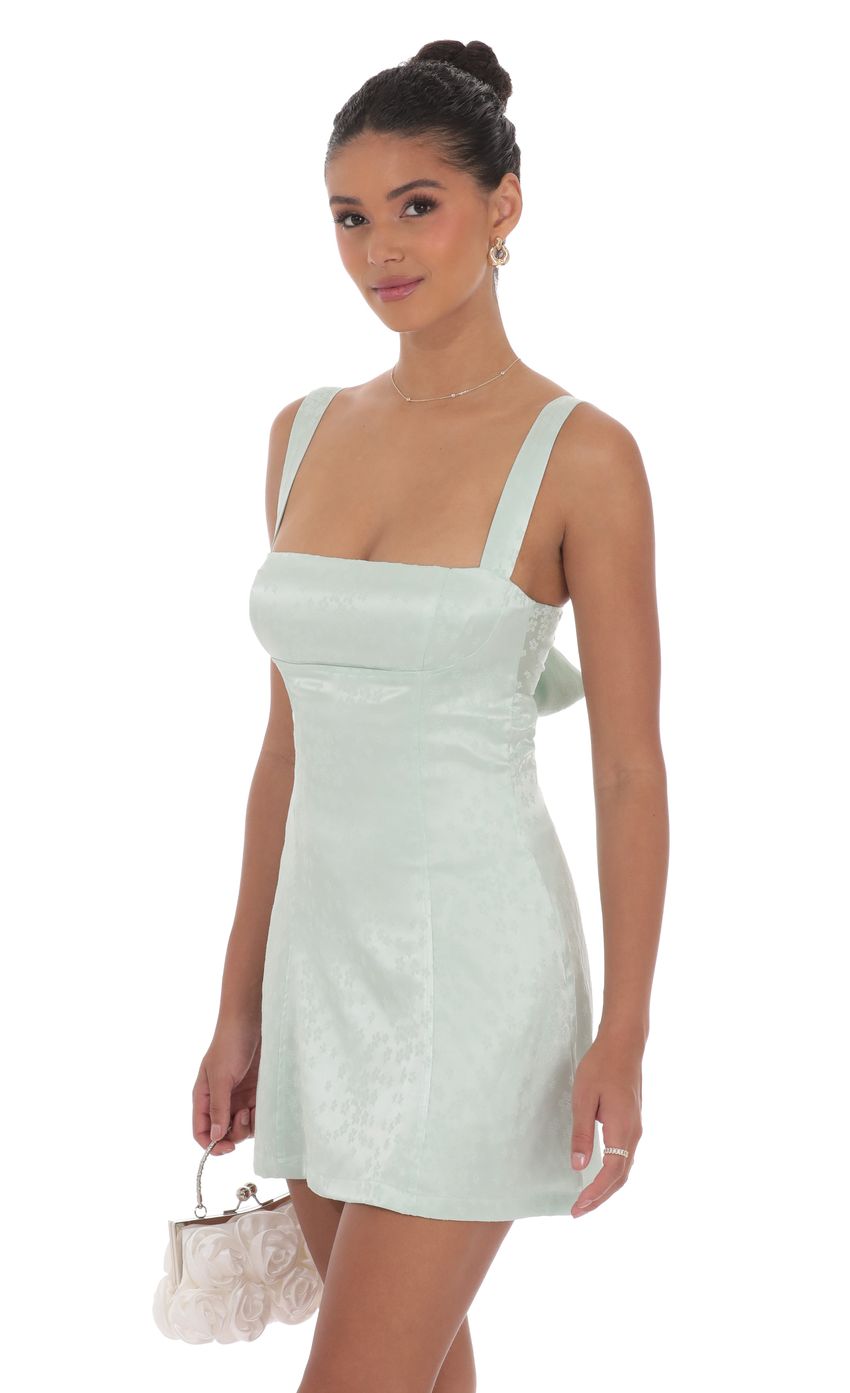 Picture Jacquard Back Bow Bodycon Dress in Mint Green. Source: https://media-img.lucyinthesky.com/data/product-media/850xAUTO/6eb541c0-fb57-4ed2-abaf-3835a36d0693.jpg