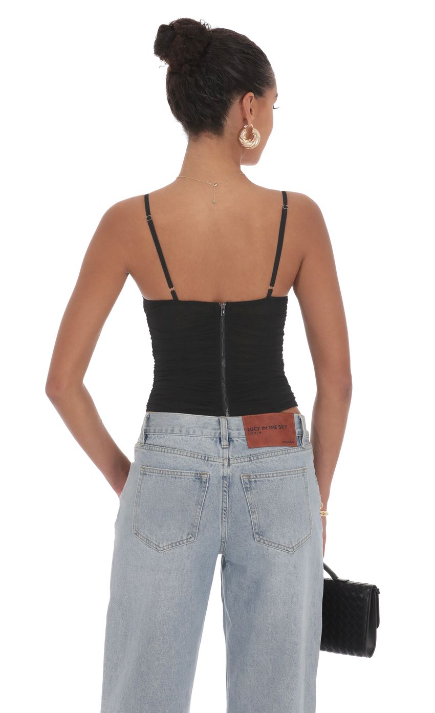 Picture Sheer Mesh Corest Top in Black. Source: https://media-img.lucyinthesky.com/data/product-media/850xAUTO/6ec5d7c0-64b4-469d-badc-6dde7114cf9d.jpg