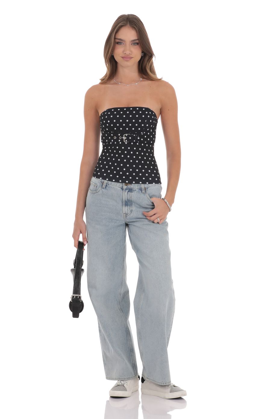 Picture Polka Dot Strapless Buckle Top in Black. Source: https://media-img.lucyinthesky.com/data/product-media/850xAUTO/74175eee-72e3-435e-a951-16b1f7ca63dd.jpg