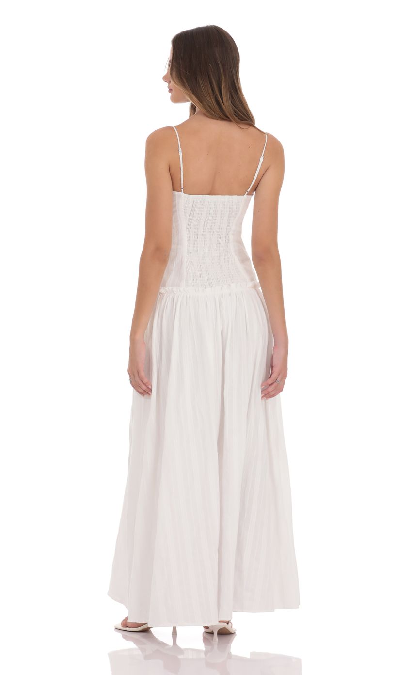 Picture Embroidered Striped Maxi Dress in White. Source: https://media-img.lucyinthesky.com/data/product-media/850xAUTO/74d0d782-4ccc-4a59-83fd-18f3e2733b77.jpg