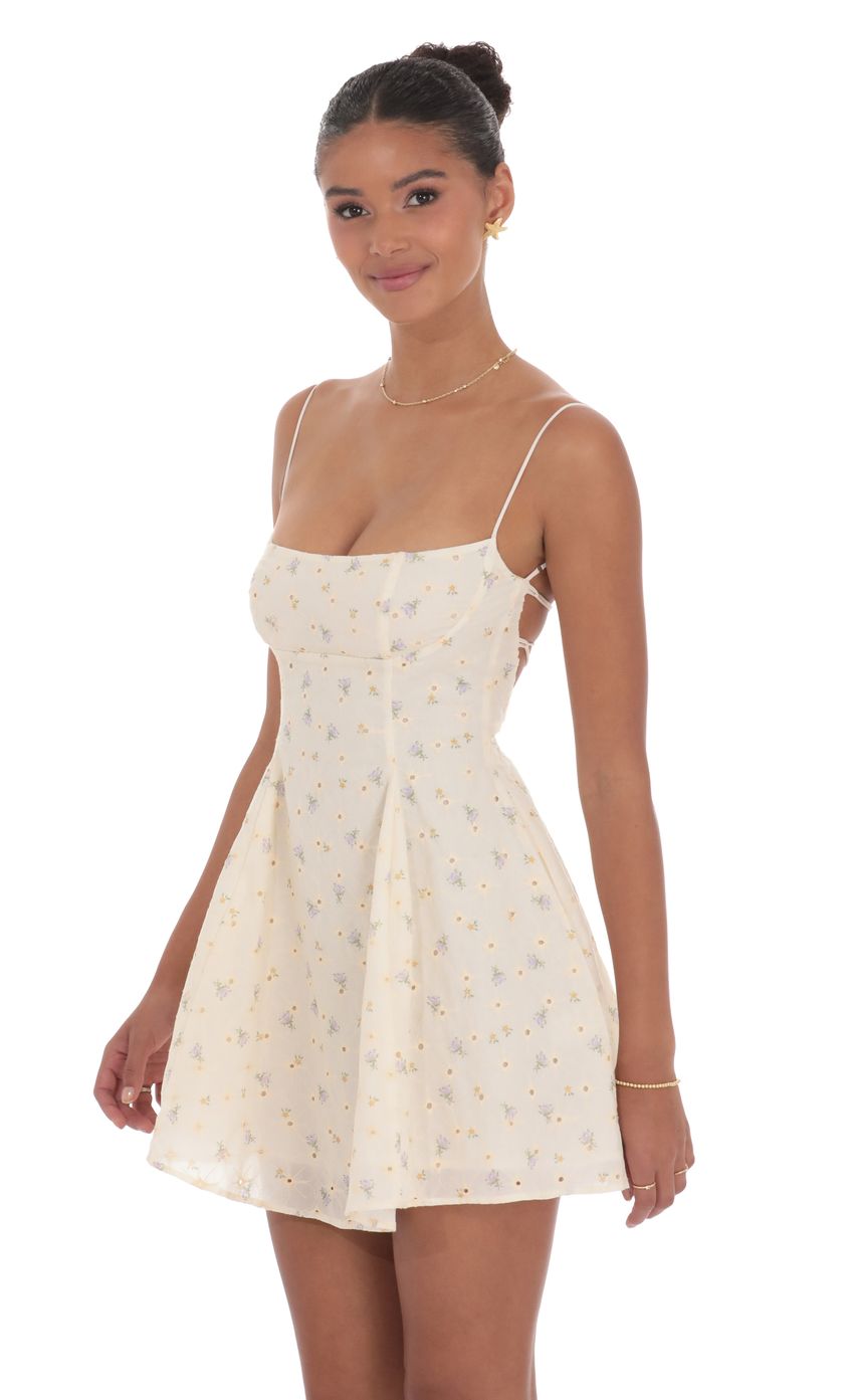 Picture Floral Eyelet Fit and Flare Dress in Cream. Source: https://media-img.lucyinthesky.com/data/product-media/850xAUTO/7a49546f-bb37-48f5-a2b4-f18a3ac6f96f.jpg