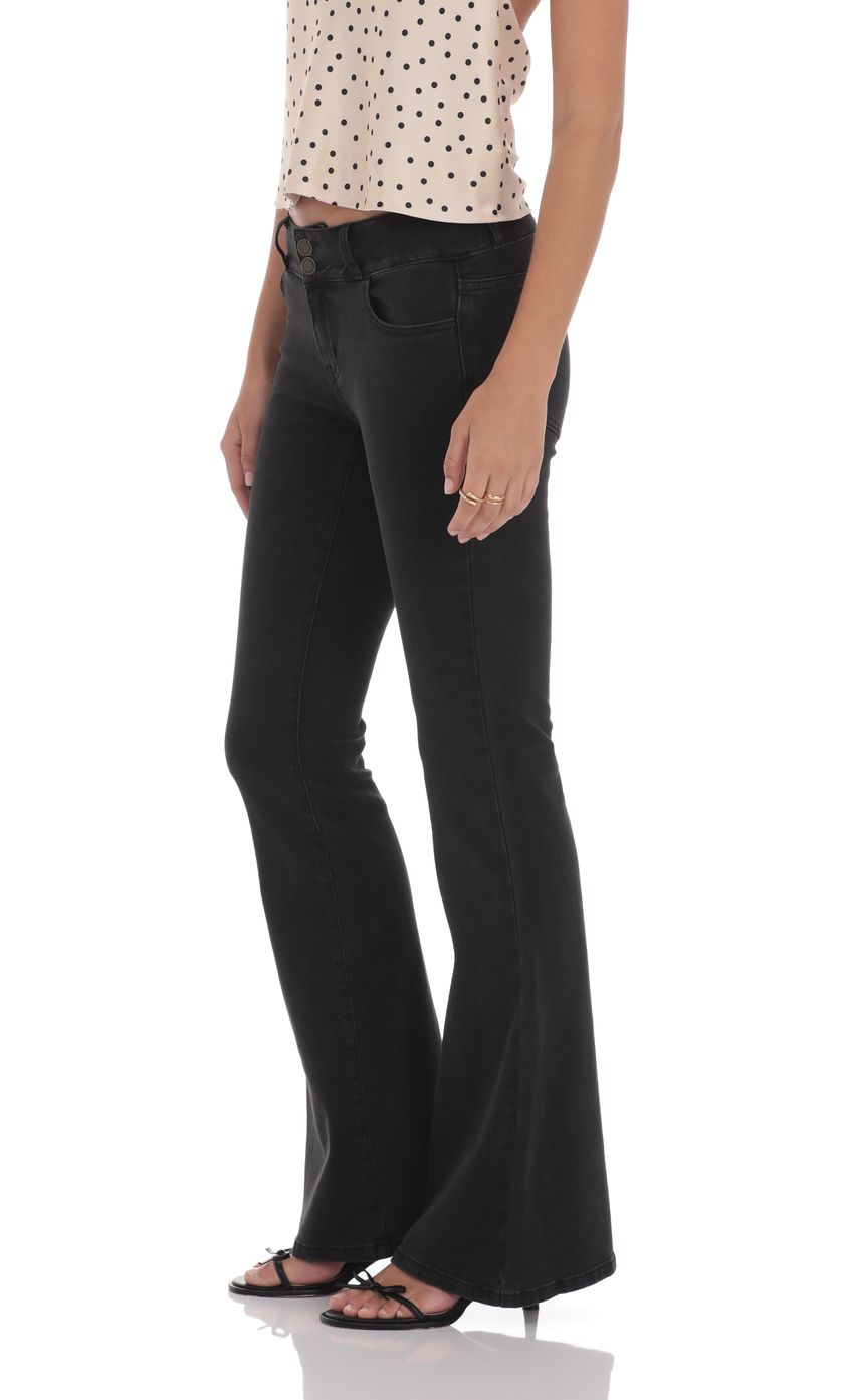 Picture Low Rise Flare Jeans in Black. Source: https://media-img.lucyinthesky.com/data/product-media/850xAUTO/81d9ed45-364c-483c-96f5-3f3a44a93031.jpg