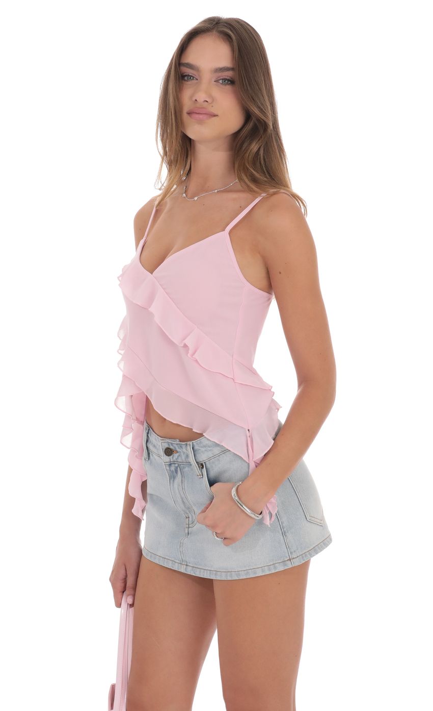 Picture Ruffle Tassel Top in Pink. Source: https://media-img.lucyinthesky.com/data/product-media/850xAUTO/869c8762-ff91-4f88-bfc3-fbf90da1a375.jpg