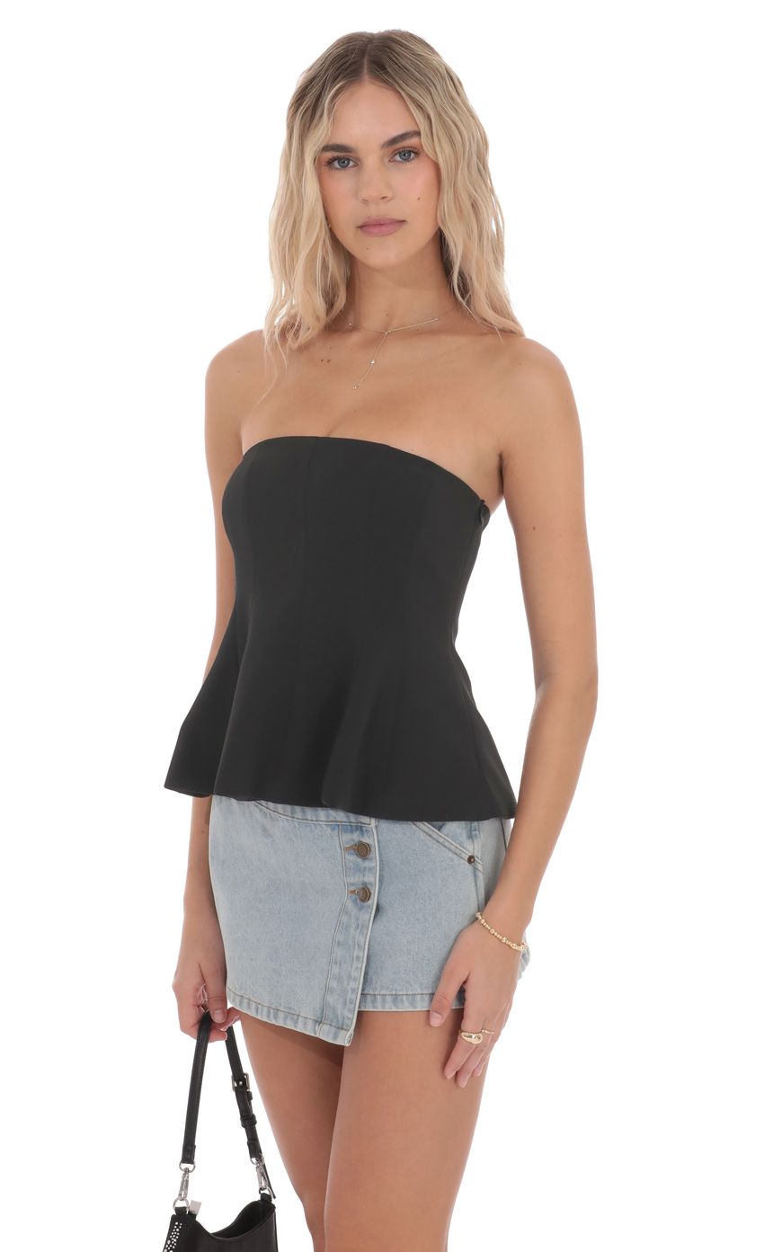Picture Strapless Peplum Top in Black. Source: https://media-img.lucyinthesky.com/data/product-media/850xAUTO/86e31319-9b8f-46c8-b5e2-d3da81b2d605.jpg