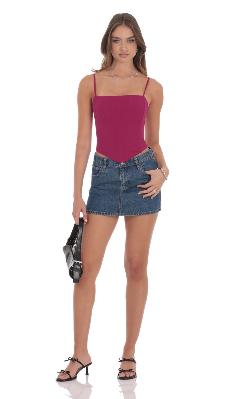 Picture Pointed Corset Top in Magenta. Source: https://media-img.lucyinthesky.com/data/product-media/850xAUTO/8a8e0ac0-67be-4cdd-9e0e-2d956a5ebff9.jpg
