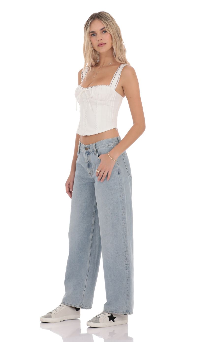 Picture Low Rise Baggy Jeans in Light Blue. Source: https://media-img.lucyinthesky.com/data/product-media/850xAUTO/8ab9fb84-0b89-499b-acb8-3c4e901b9939.jpg