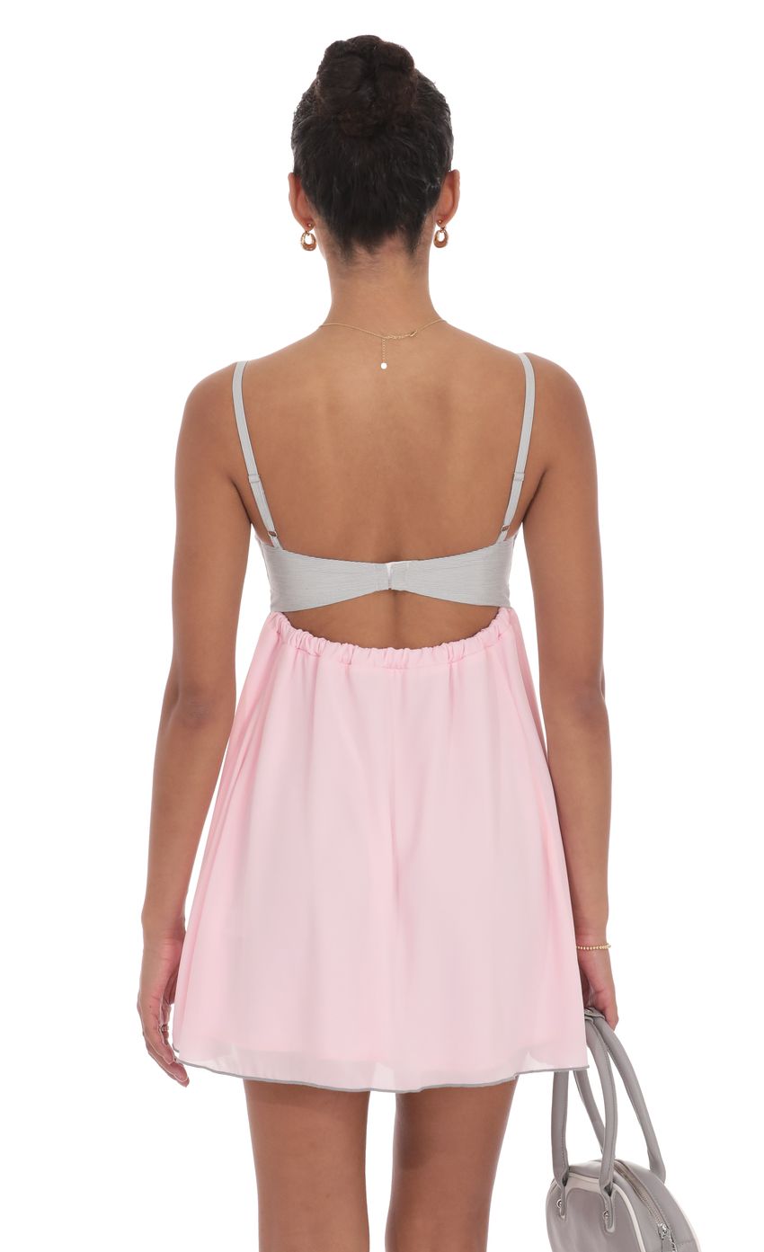 Picture Two Toned Striped Babydoll Dress in Pink. Source: https://media-img.lucyinthesky.com/data/product-media/850xAUTO/8b7682f2-c4f2-49d6-9871-35c3fea90259.jpg