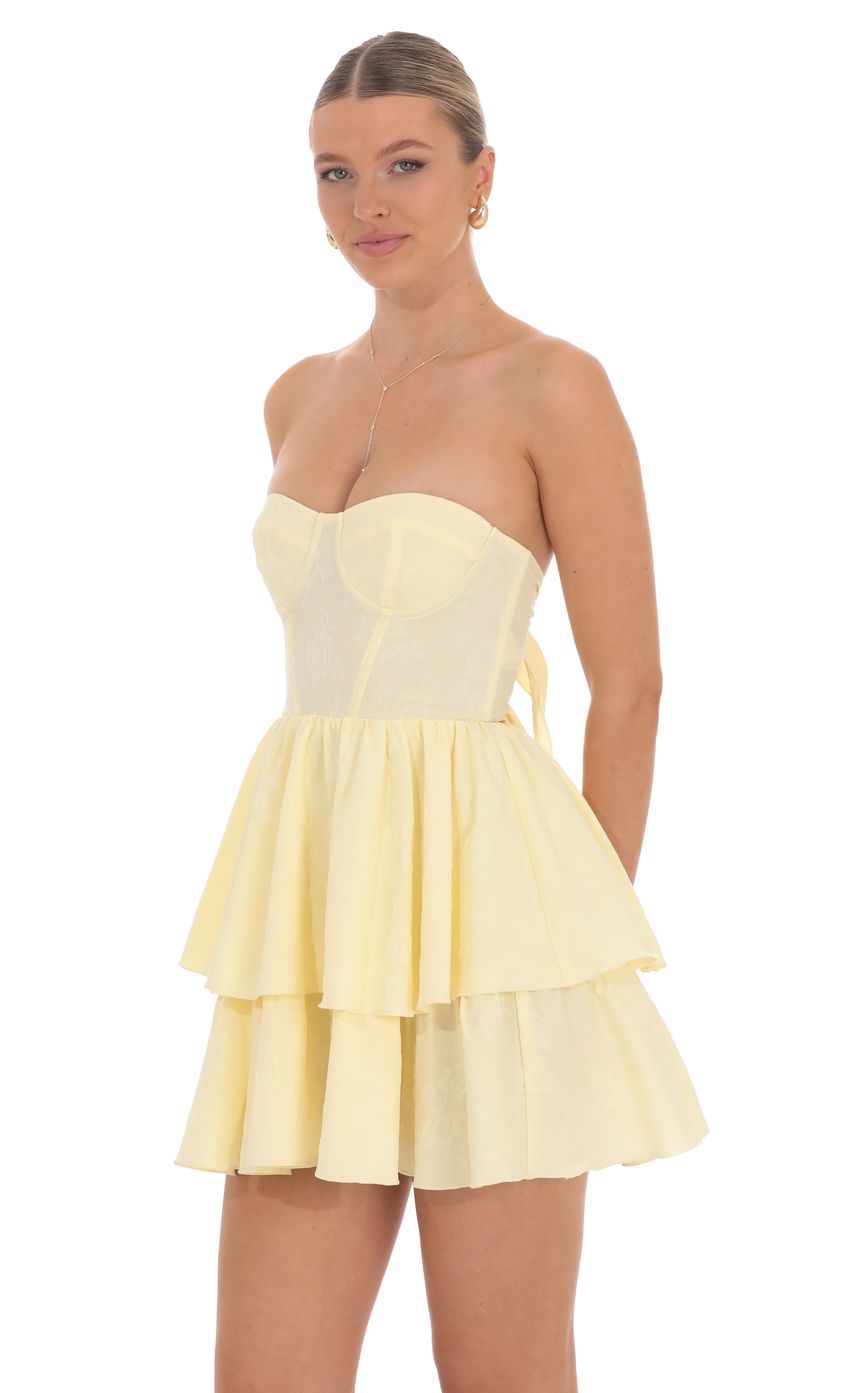 Picture Jacquard Corset Mini Dress in Yellow. Source: https://media-img.lucyinthesky.com/data/product-media/850xAUTO/8de7d33b-3aec-4ae0-ab5f-bbb2e6912532.jpg