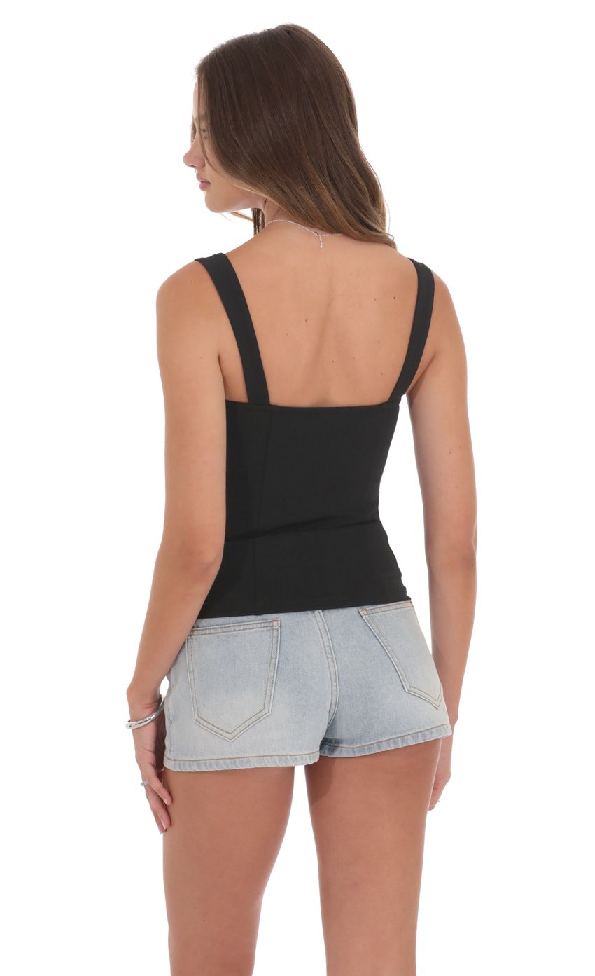 Picture Lace Bust Top in Black. Source: https://media-img.lucyinthesky.com/data/product-media/850xAUTO/8f911d05-7830-4023-a2c1-9296615d667f.jpg