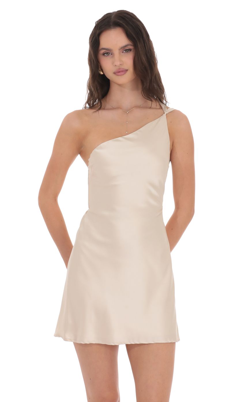 Picture Satin One Shoulder Open Back Dress in Champagne. Source: https://media-img.lucyinthesky.com/data/product-media/850xAUTO/900469d0-8a60-49ac-b6f2-2f9764eb1498.jpg