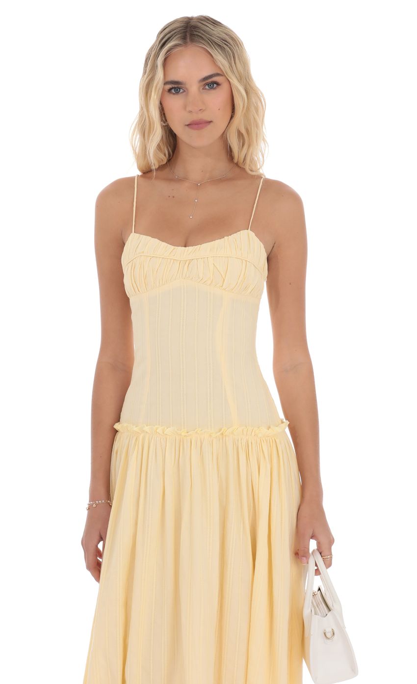 Picture Embroidered Striped Maxi Dress in Yellow. Source: https://media-img.lucyinthesky.com/data/product-media/850xAUTO/92797d35-b6ce-422e-9610-2fe4cb6edaca.jpg
