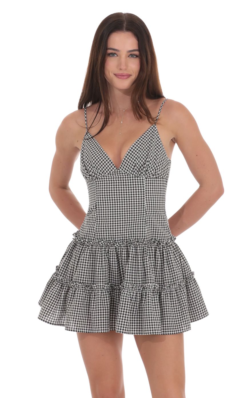 Picture Gingham V-Neck Dress in Black and White. Source: https://media-img.lucyinthesky.com/data/product-media/850xAUTO/9644e627-c991-46f6-9d9d-67df17a2741c.jpg