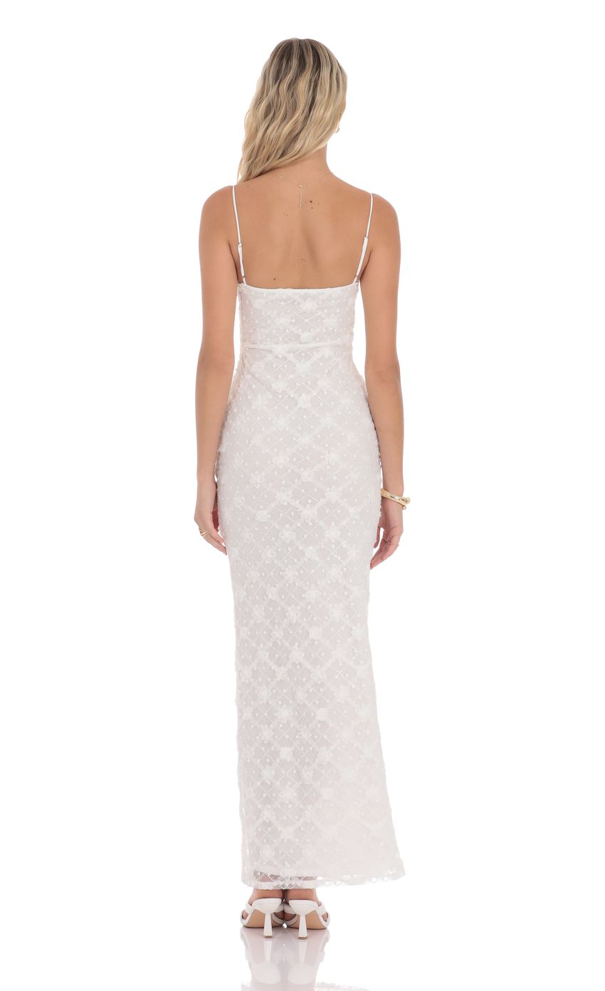 Picture Sequin Floral Maxi Dress in White. Source: https://media-img.lucyinthesky.com/data/product-media/850xAUTO/97de79de-ff5c-43e0-8804-c6c816273cf7.jpg