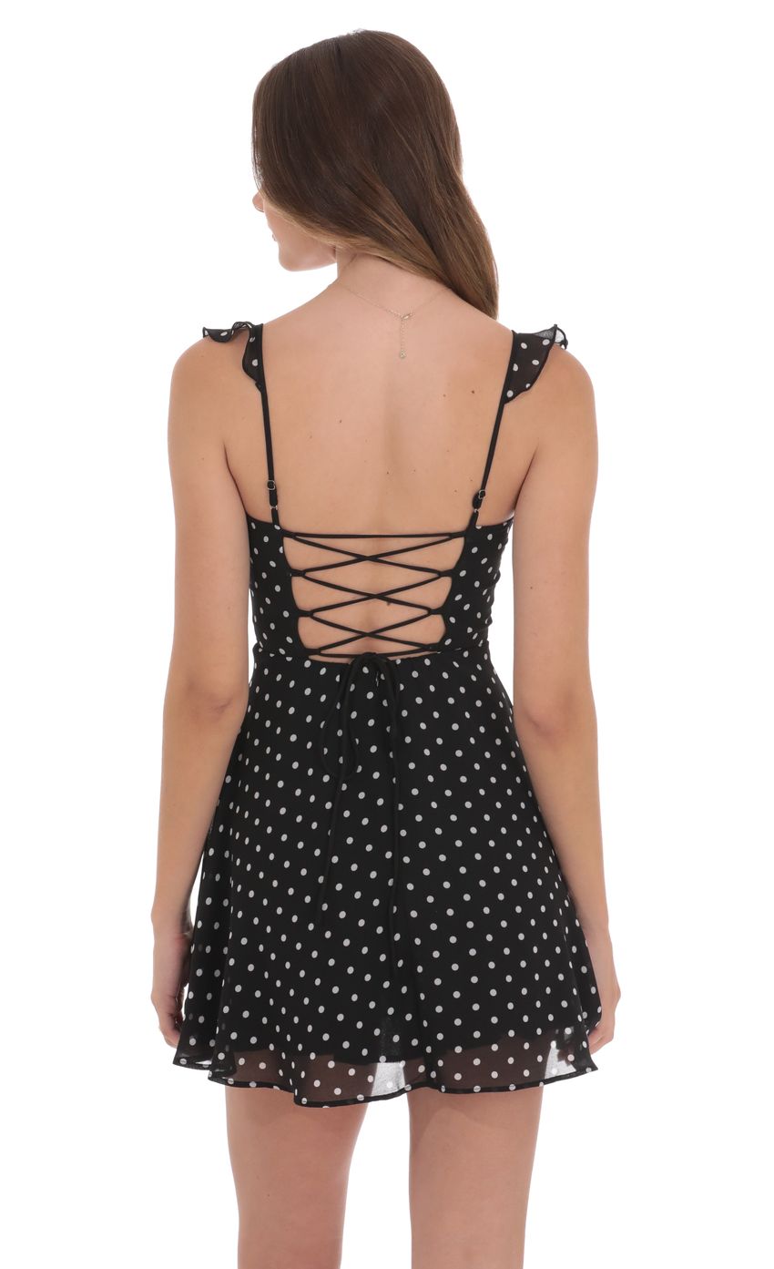 Picture Polka Dot Ruffle Strap A-Line Dress in Black. Source: https://media-img.lucyinthesky.com/data/product-media/850xAUTO/98a42e7a-d8bd-4936-b67d-c2abc9b3cdfb.jpg