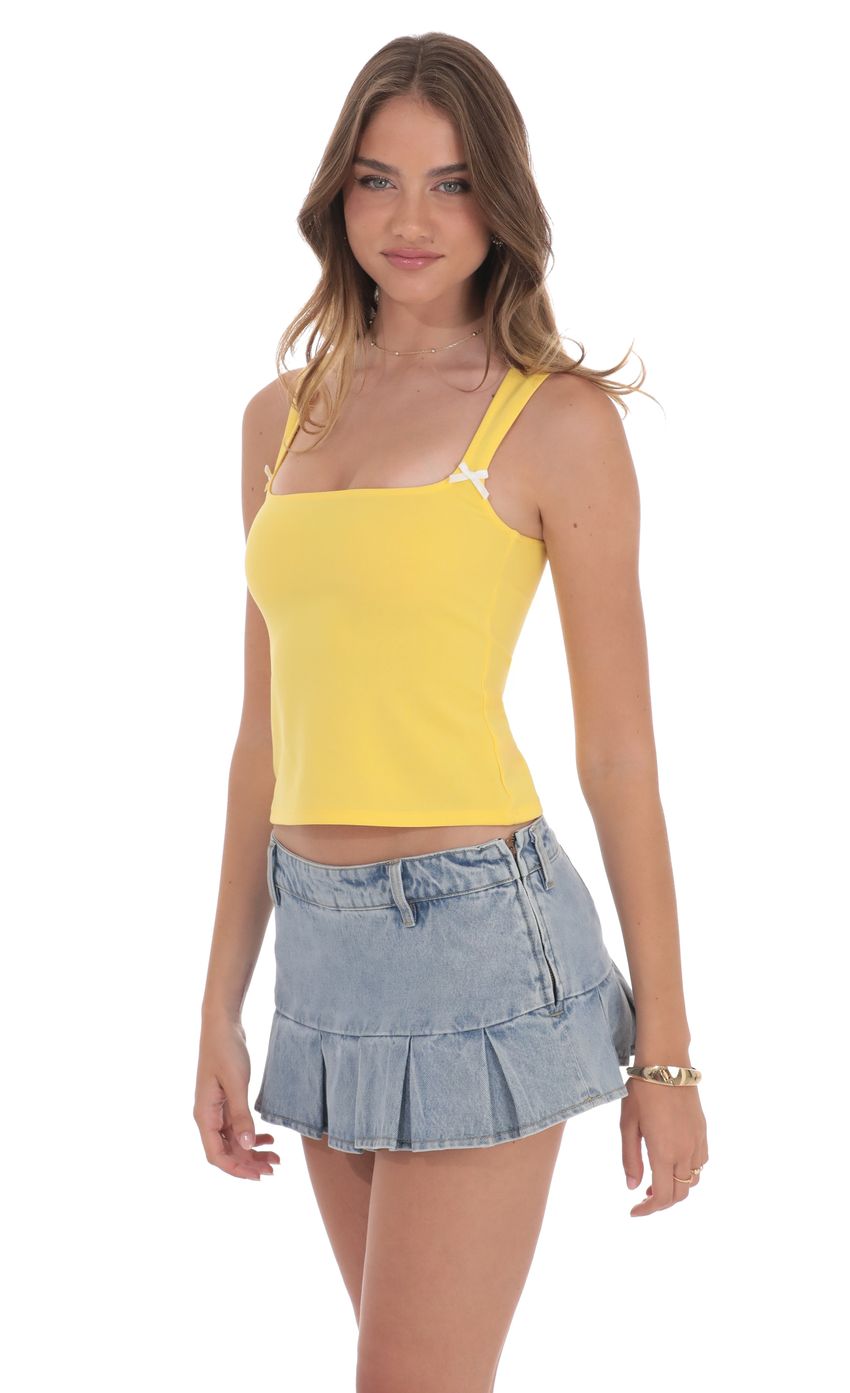 Picture Double Bow Top in Yellow. Source: https://media-img.lucyinthesky.com/data/product-media/850xAUTO/99c7b75a-1637-4f08-a36e-37f8cab21ece.jpg