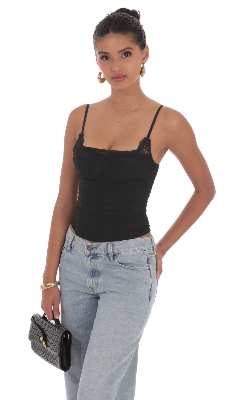 Picture Sheer Mesh Corest Top in Black. Source: https://media-img.lucyinthesky.com/data/product-media/850xAUTO/9a5c1d8b-2f1b-4a47-a741-26f1aab9b656.jpg