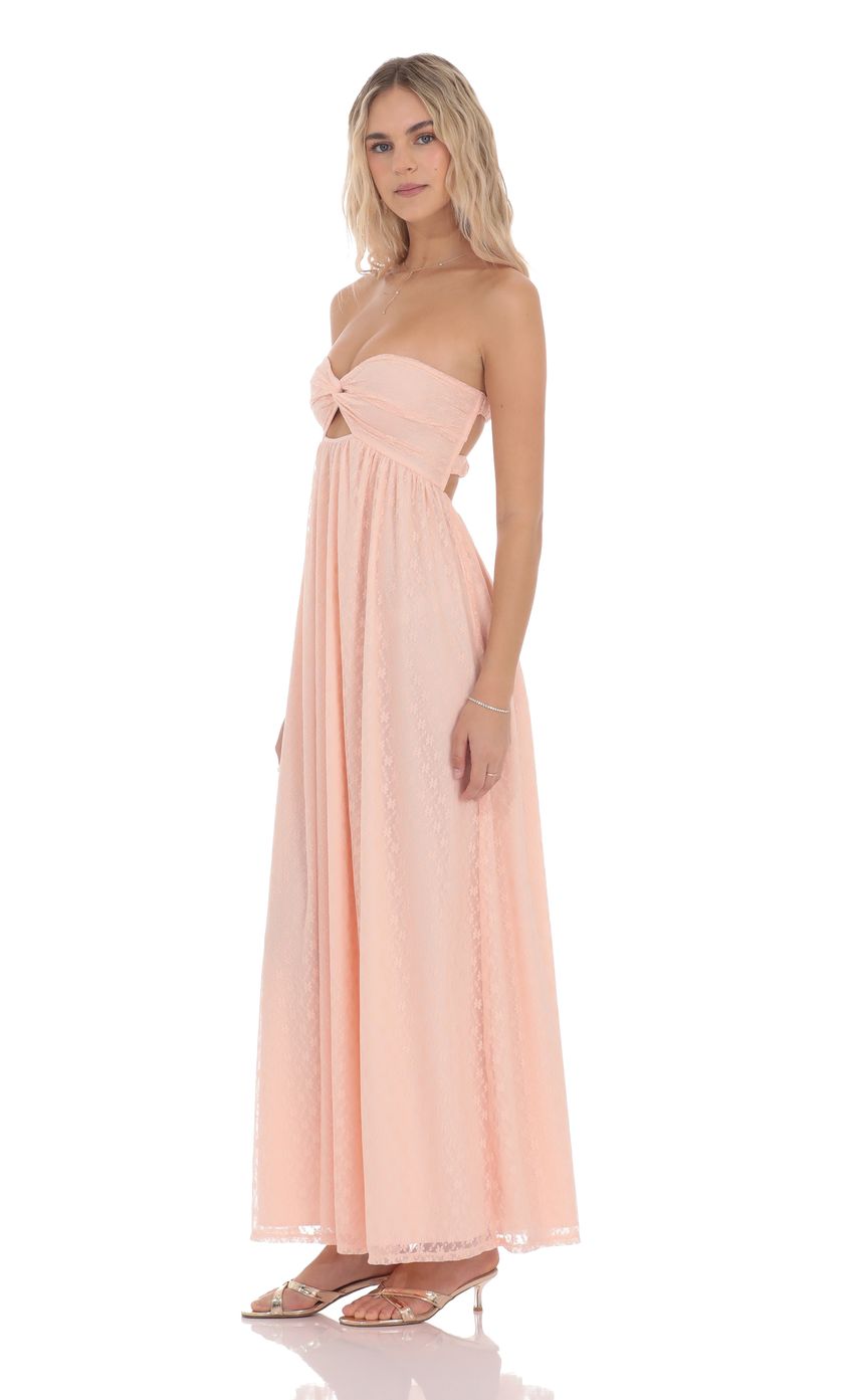 Picture Strapless Lace Cutout Dress in Peach. Source: https://media-img.lucyinthesky.com/data/product-media/850xAUTO/9bcfdf6e-bd41-4ebd-bce6-c616679b11a9.jpg