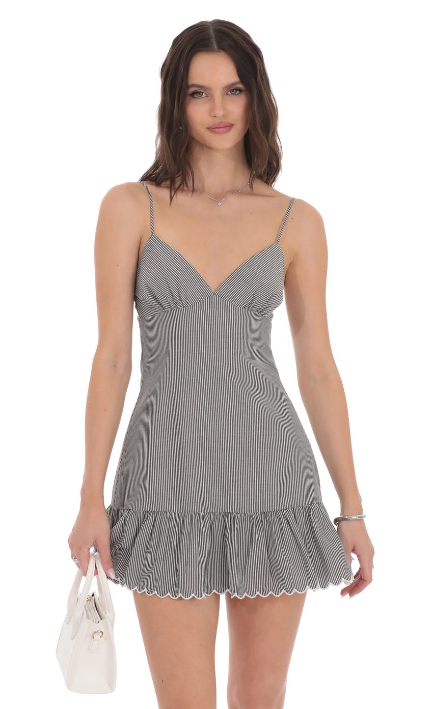 Picture Pinstripe Scallop Ruffle Dress in Grey. Source: https://media-img.lucyinthesky.com/data/product-media/850xAUTO/9d69a17e-baa4-4c7e-9f89-b6765a771e45.jpg