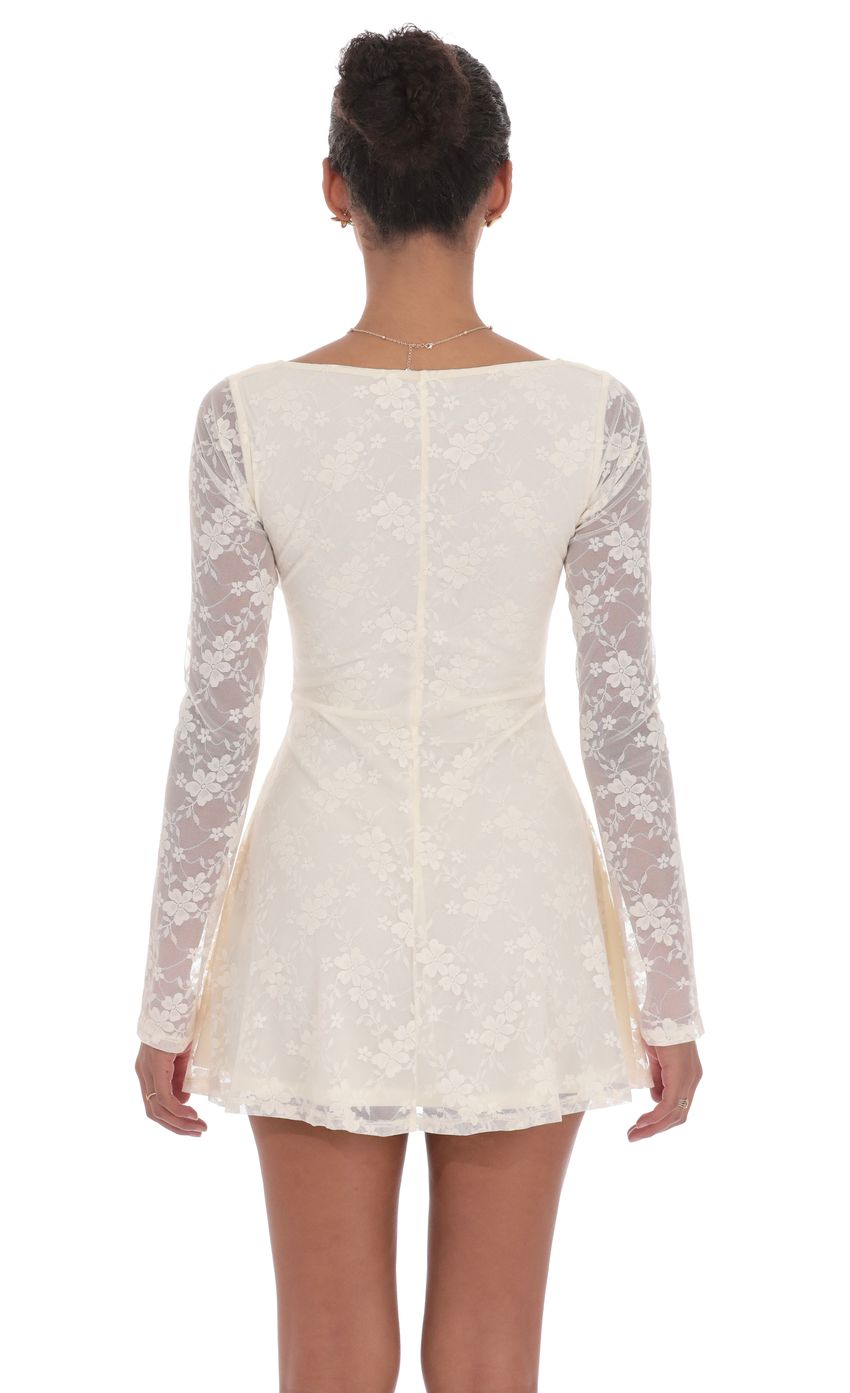 Picture Lace Twist Cutout Dress in Cream. Source: https://media-img.lucyinthesky.com/data/product-media/850xAUTO/9e16c946-1dfe-4891-8d57-ffbff4f56694.jpg