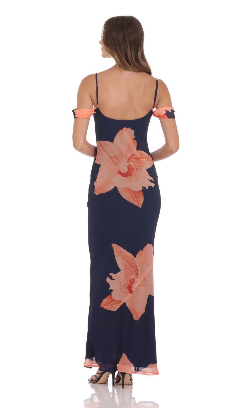 Picture Orange Floral Off Shoulder Maxi Dress in Navy. Source: https://media-img.lucyinthesky.com/data/product-media/850xAUTO/9eb1bb7d-3923-4f0e-a72d-427d6f0a517f.jpg
