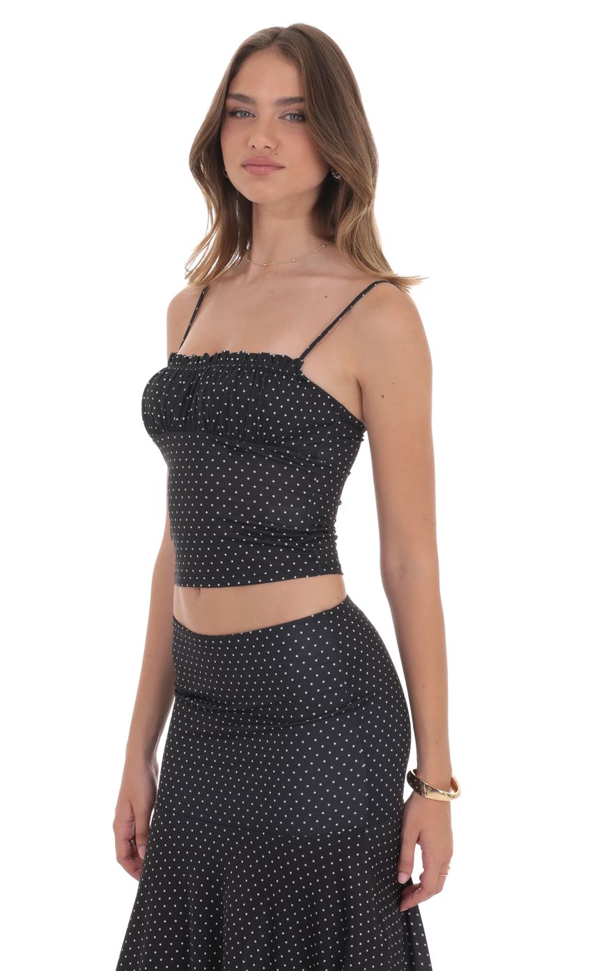 Picture Polka Dot Ruched Bust Top in Black. Source: https://media-img.lucyinthesky.com/data/product-media/850xAUTO/9ebd25d8-85f1-4e6c-bd39-f774b3e0c3bb.jpg