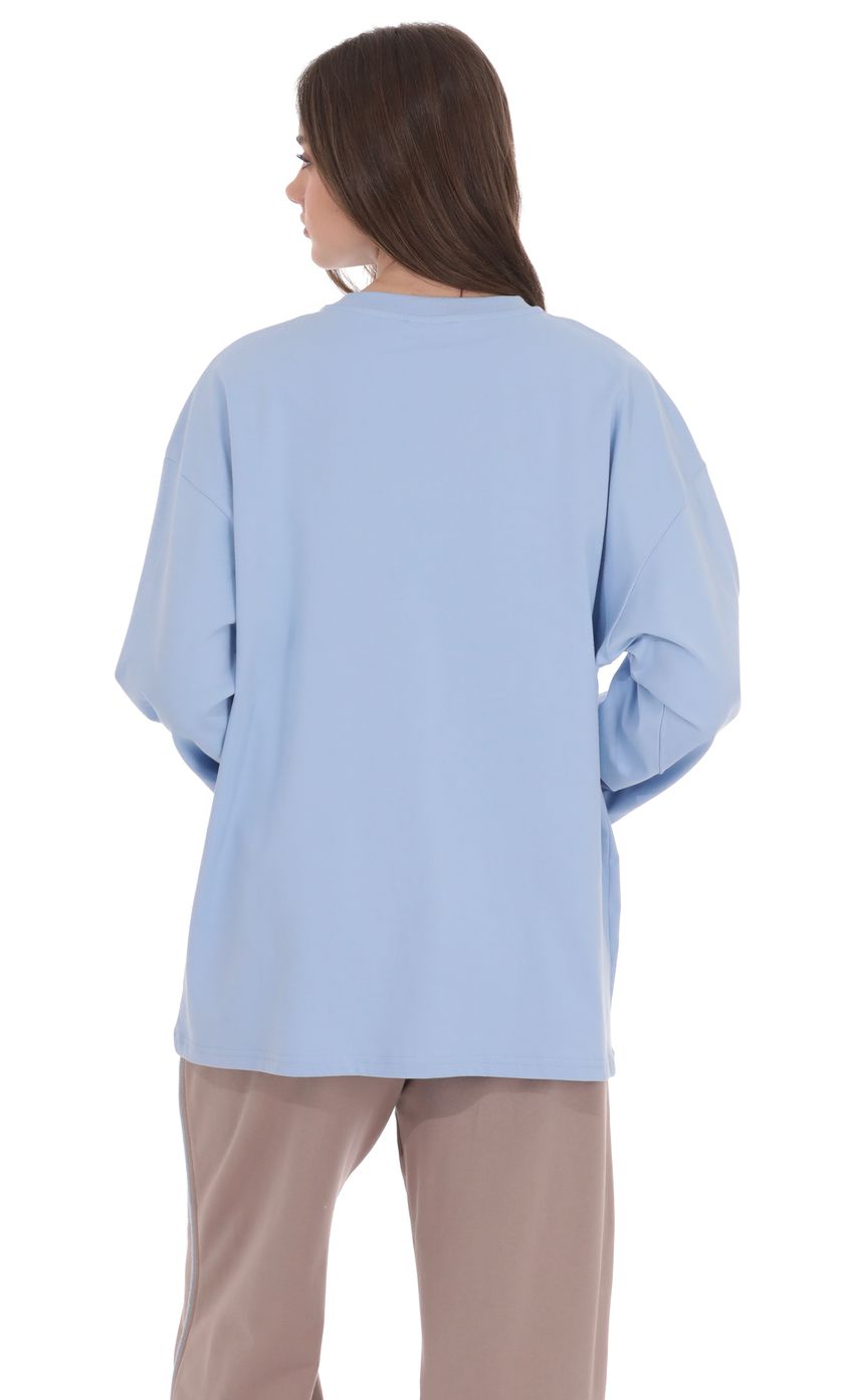 Product image for Lucy Graphic Crewneck Shirt in Light Blue