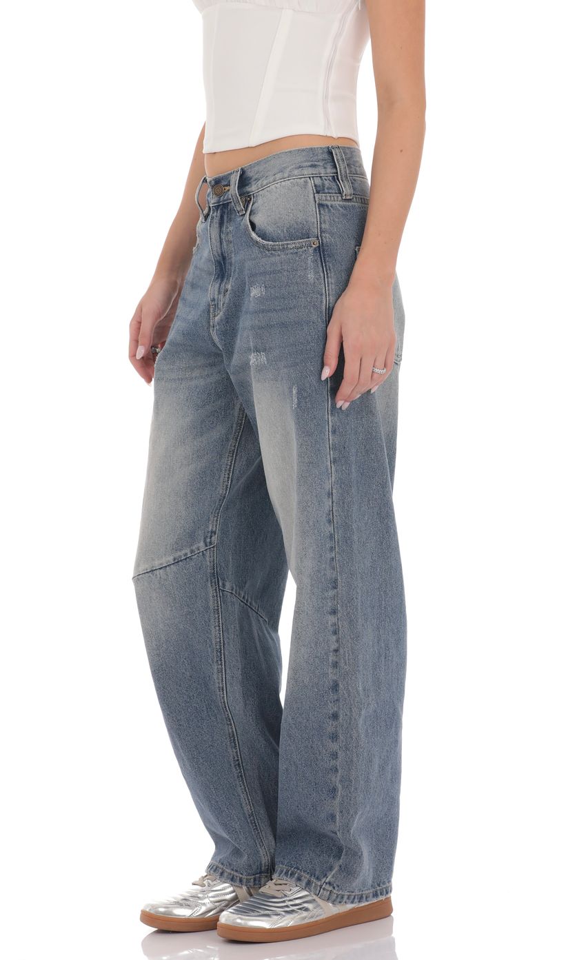 Picture Distress Barrel Jeans in Faded Denim. Source: https://media-img.lucyinthesky.com/data/product-media/850xAUTO/a95cf209-2121-4134-8592-cd29130ca474.jpg
